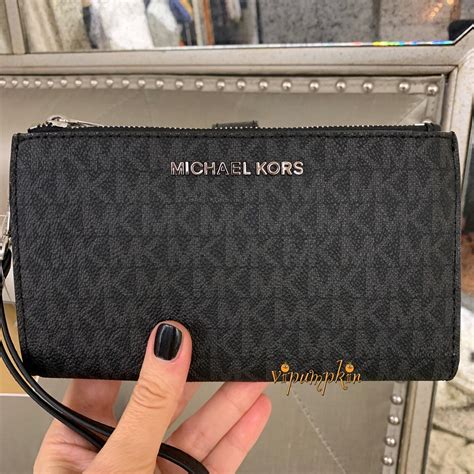 black and silver michael kors wristlet|Michael Kors wristlet jet set.